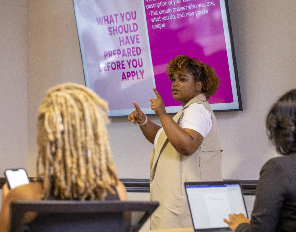 Autumn, the owner of Proxie, teaches a class about entrepreneurship