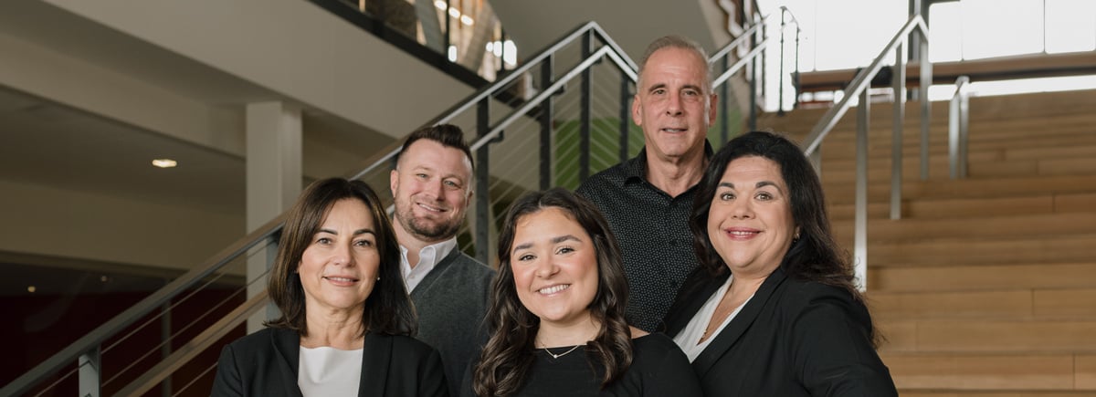 Mortgage Center team members standing in a group.