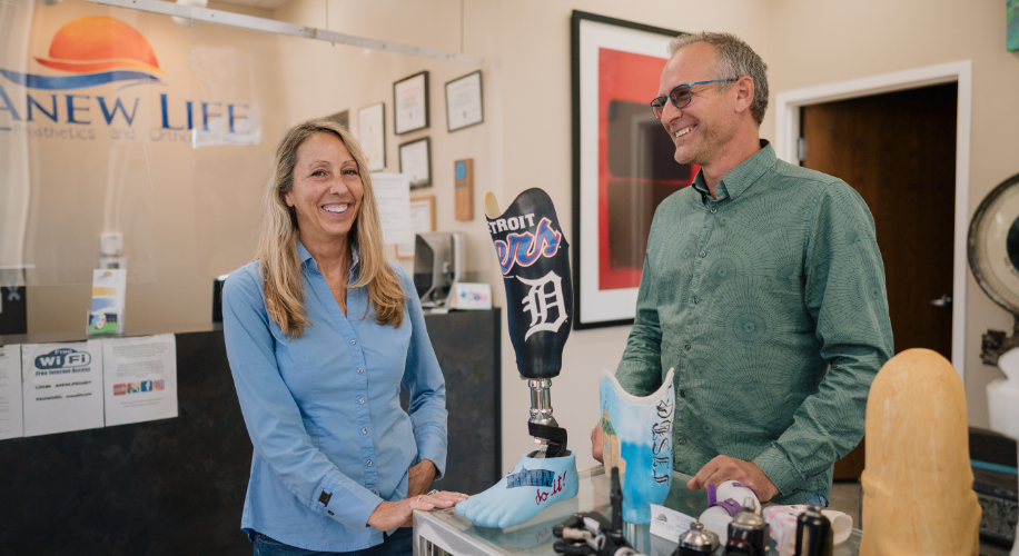 Kim and Chris, the owners of Anew Life Prosthetics and Orthotics in their store in Detroit