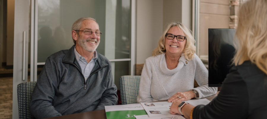 Smiling couple at Lake Trust branch