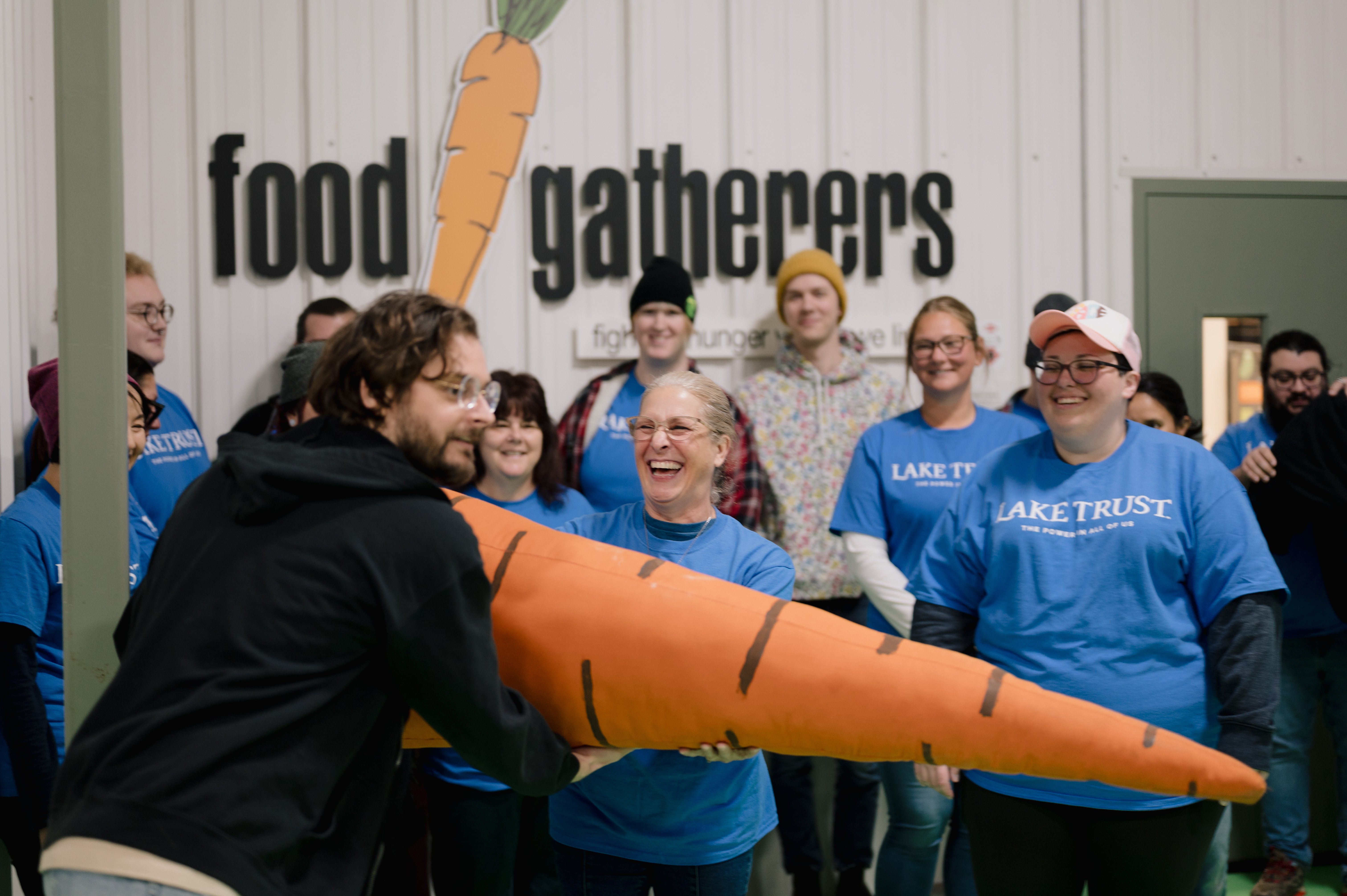 Lake Trust team members volunteering at Food Gatherers.