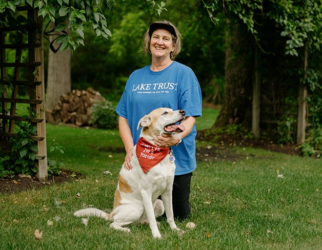 Woman standing with her dog